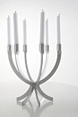 Stainless steel candlesticks on white background