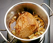 Close-up of roulade in the cooking pot