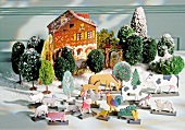 Christmas decorations with animal figures, trees and house