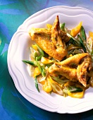 Close-up of fried chicken wings on plate