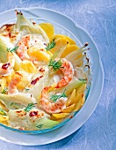 Fennel gratin with prawns, potatoes, cream and parmesan cheese