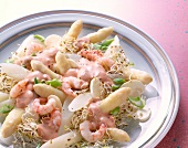 Close-up of asparagus salad with shrimp and mushrooms on plate