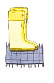 gelbe Gummistiefel auf Fußabtreter 