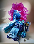 Gifts made of thick cardboard, tissue paper and ribbon