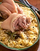 Close-up of eisbein with sauerkraut on plate