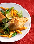 Close-up of chicken with vegetables on dish