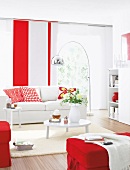 Living room with white sofa, carpet, table and red stool