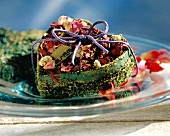 Close-up of dried flowers in heart shaped box tied with ribbon