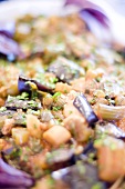 Sicilian vegetable dish with eggplant, celery and olives in serving dish