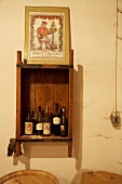 Wine bottles in wooden box in Beaumont winery, South Africa
