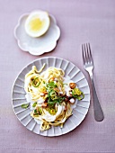 Noodles with chicken and coconut cream on plate