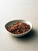 Raw red rice in bowl