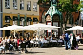 People sitting at Kultorvet restaurant in Copenhagen, Denmark