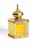 Luxus Kosmetikprodukt in gold orientalischer Parfumflakon, Amouage