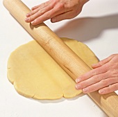 Rolling out dough with rolling pin, step 3