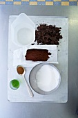 Ingredients of cocoa sorbet in baking tray