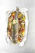 Sea bass with mussel in silver foil