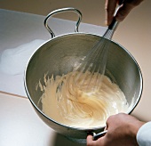 Hand whisking mixture for preparation of biscuits, step 2