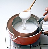 Liquid being stirred for preparation of fondant, step 2