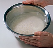 Nishiki rice with water in bowl, step 2