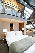 Bedroom with stairs in hotel, Germany