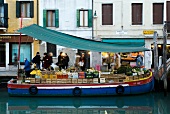Selling vegetables on ship in canal, Venice