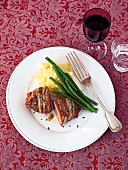 Meatloaf with rosemary with fork on plate