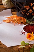 Crayfish and saffron threads on paper