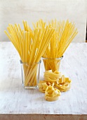 Different types of pasta in glass