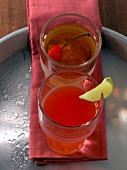 Champagne cocktail and Russian spring punch on red table cloth