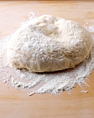 Close-up of dough of bread and flour