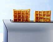 Two waffles in toaster