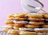 Close-up of almond waffles with powdered sugar