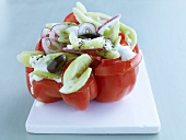 Peppers, onions, feta cheese and olives in Greek salad