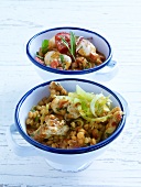 Tomato and bean salad and lentil turkey salad in two bowls