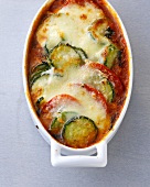 Close-up of parmigiana with zucchini in serving dish
