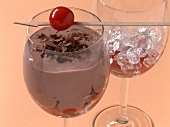 Close-up of ice and spice chocolate drink in glass