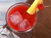 Pussy foot drink in glass with pineapple and cherry on rim