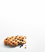 Flat bread with black olives on white background