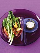 Chard and peach salad with warm goat's cheese