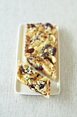 Plum and almond tart in serving tray