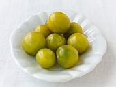 Green grape variety yellow-green tomato in bowl