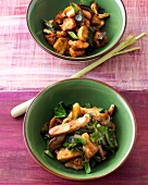 Chicken with mushrooms and lime turkey with oyster mushrooms in bowls