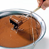 Chocolate dipped marzipan chocolate on fork, step 2