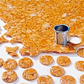 Brittle sting platelets being cut into circular shapes, step 1