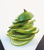 Close-up of cut lime slices piled up