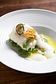 Monkfish with beans, foam and parsley