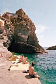 View of tourist at bay in Manarola at Cinque Terre, Italy