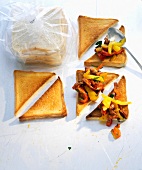Crostini with pepper, chilli bacon and toast bag