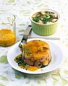 Mushroom jelly with chives and vinaigrette on plate